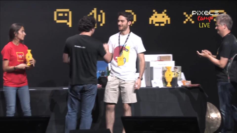 Picture of the ceremony, receiving the trophy for 3rd place.