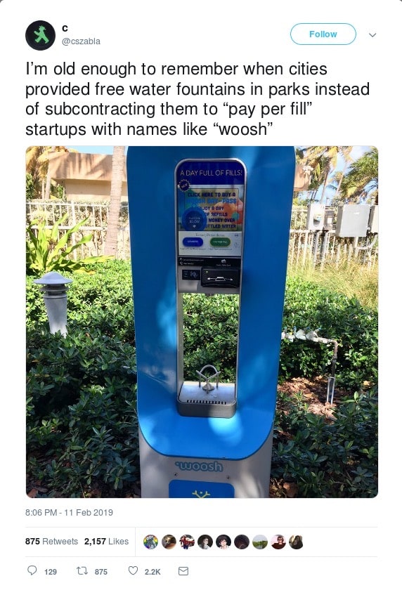 A paying public kiosk to dispense water which likely requires an app.